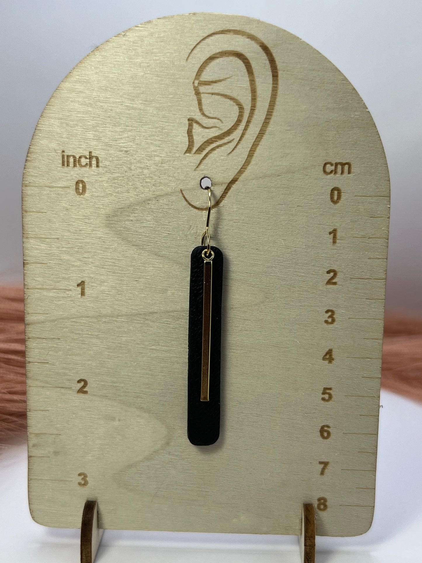 Black elongated drop dangles