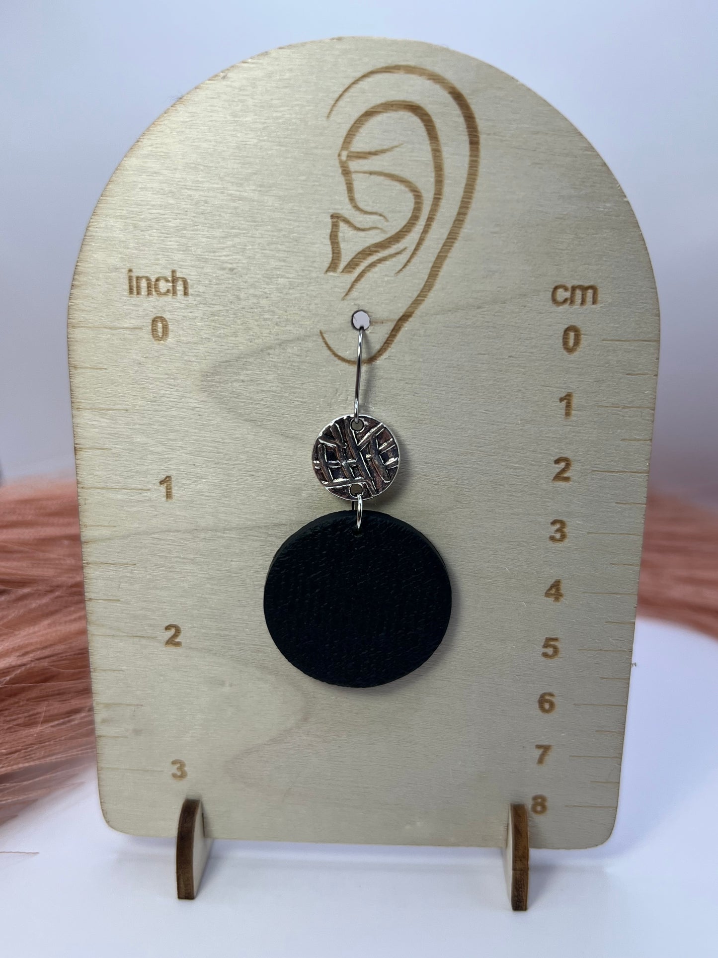 Black circular dangles