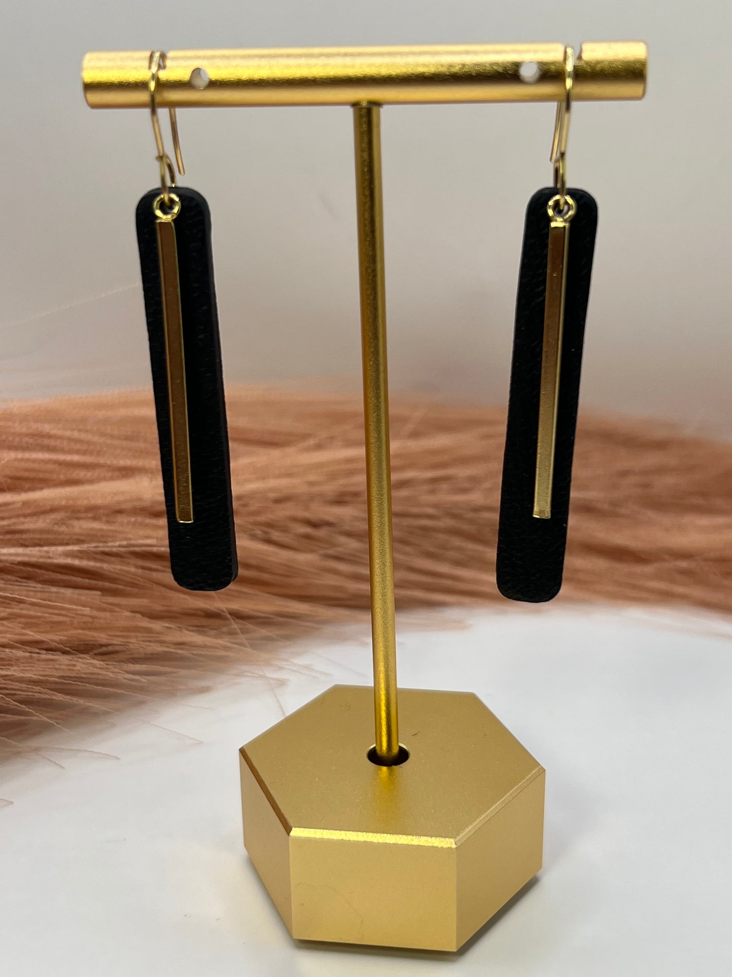 Black elongated drop dangles