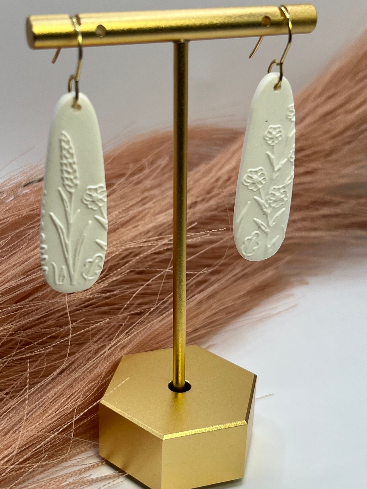 White floral imprinted dangles