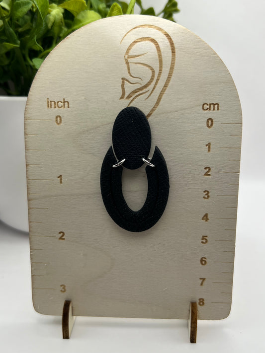 Black oval dangles