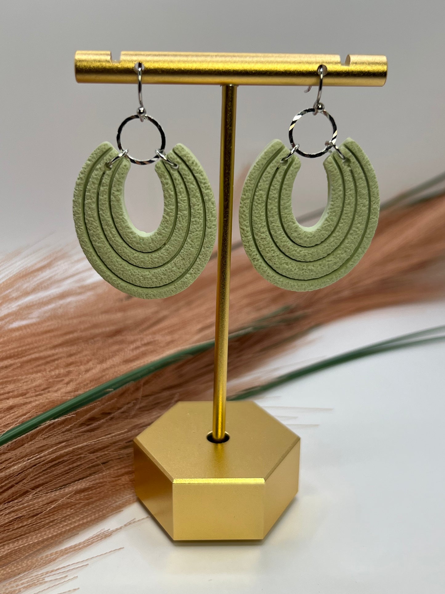Mint green imprinted dangles