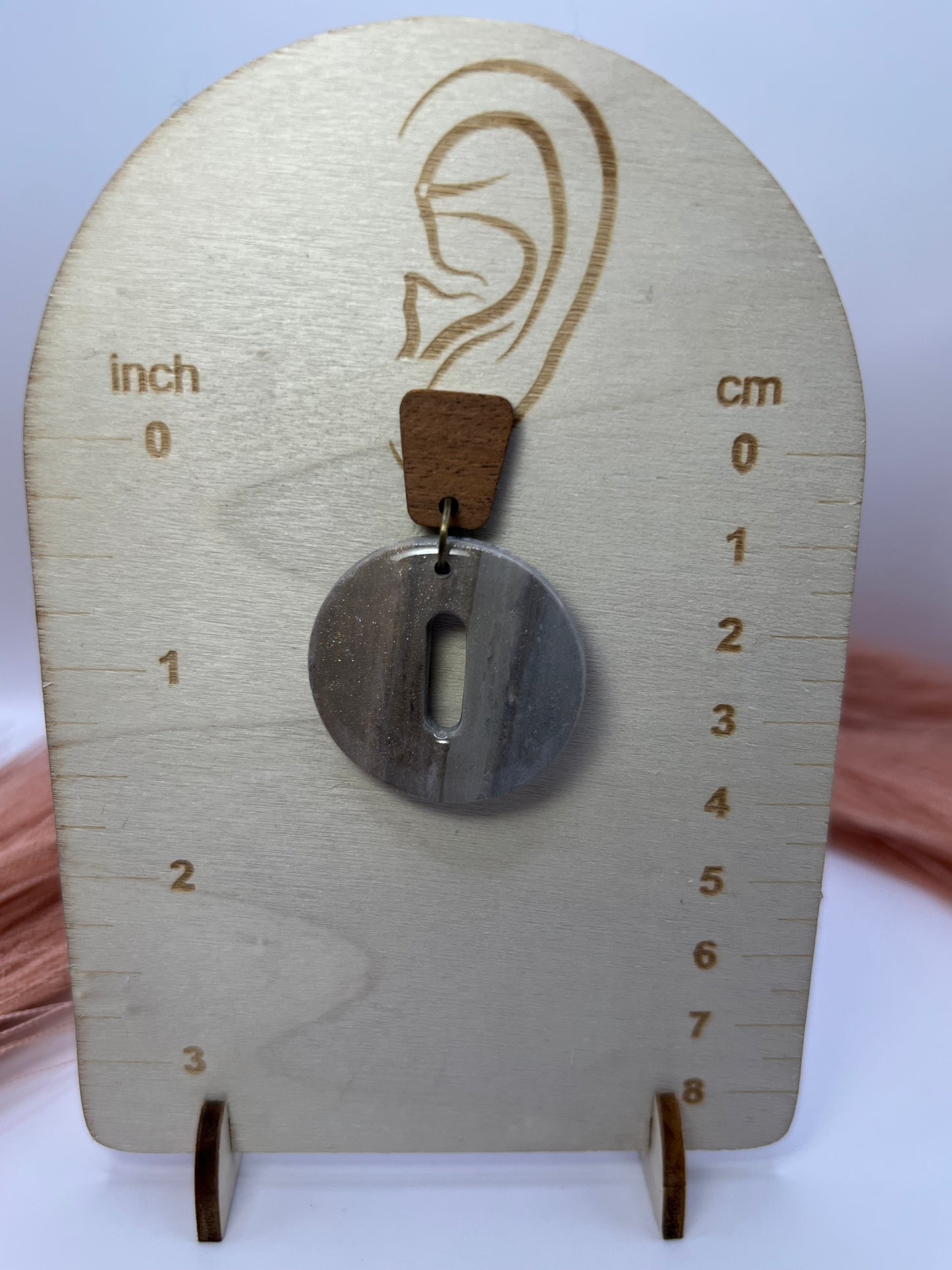 Gray marbled circular wooden dangles