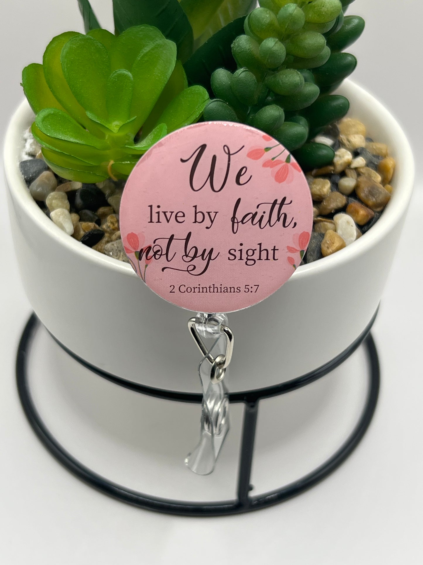 “We live by faith” badge reel