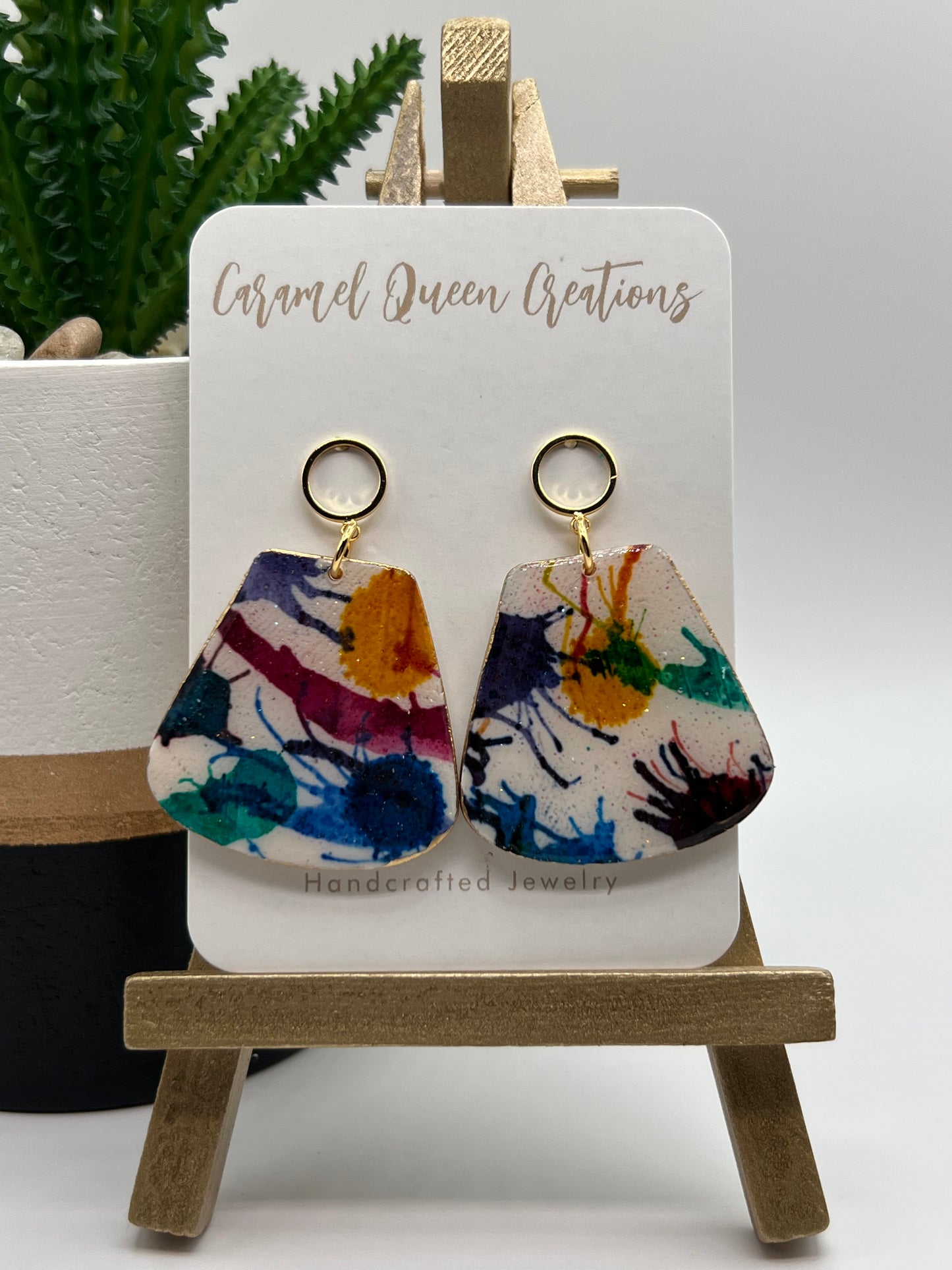 Paint splatter inspired dangles with gold trim