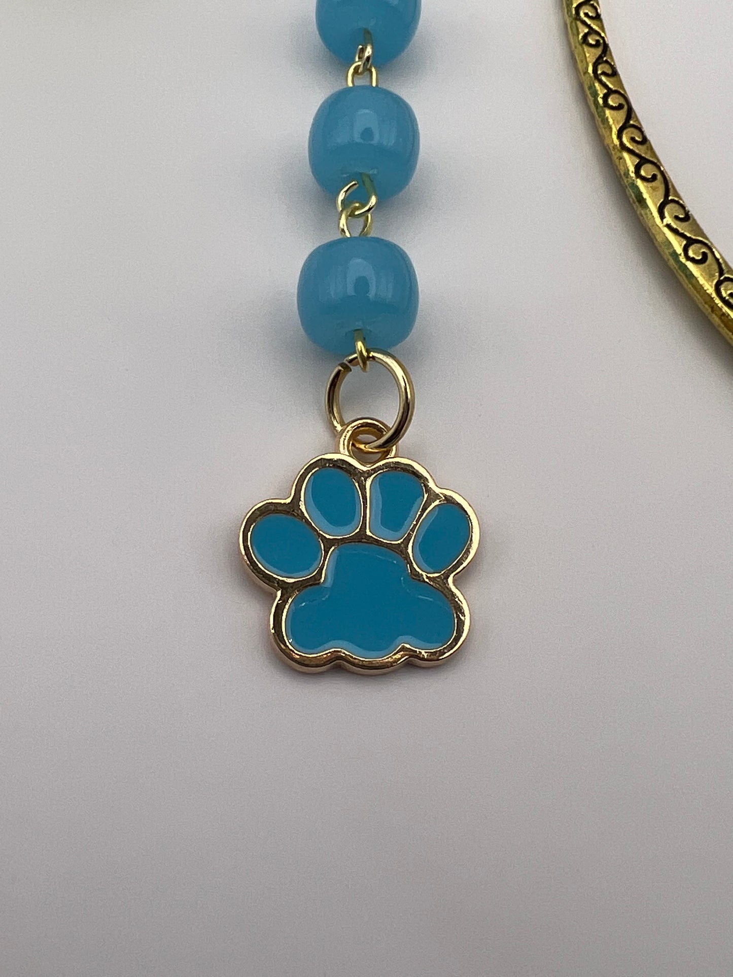 Turquoise dog paw beaded bookmark