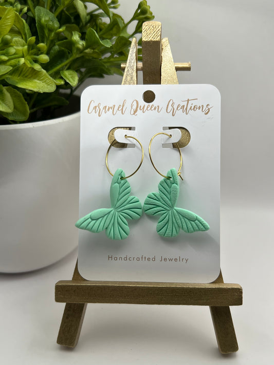 Mint green butterfly polymer clay dangle