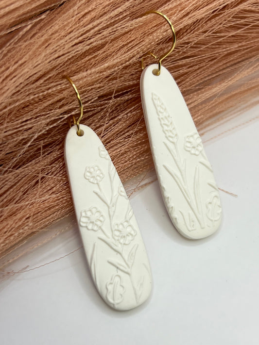 White floral imprinted dangles