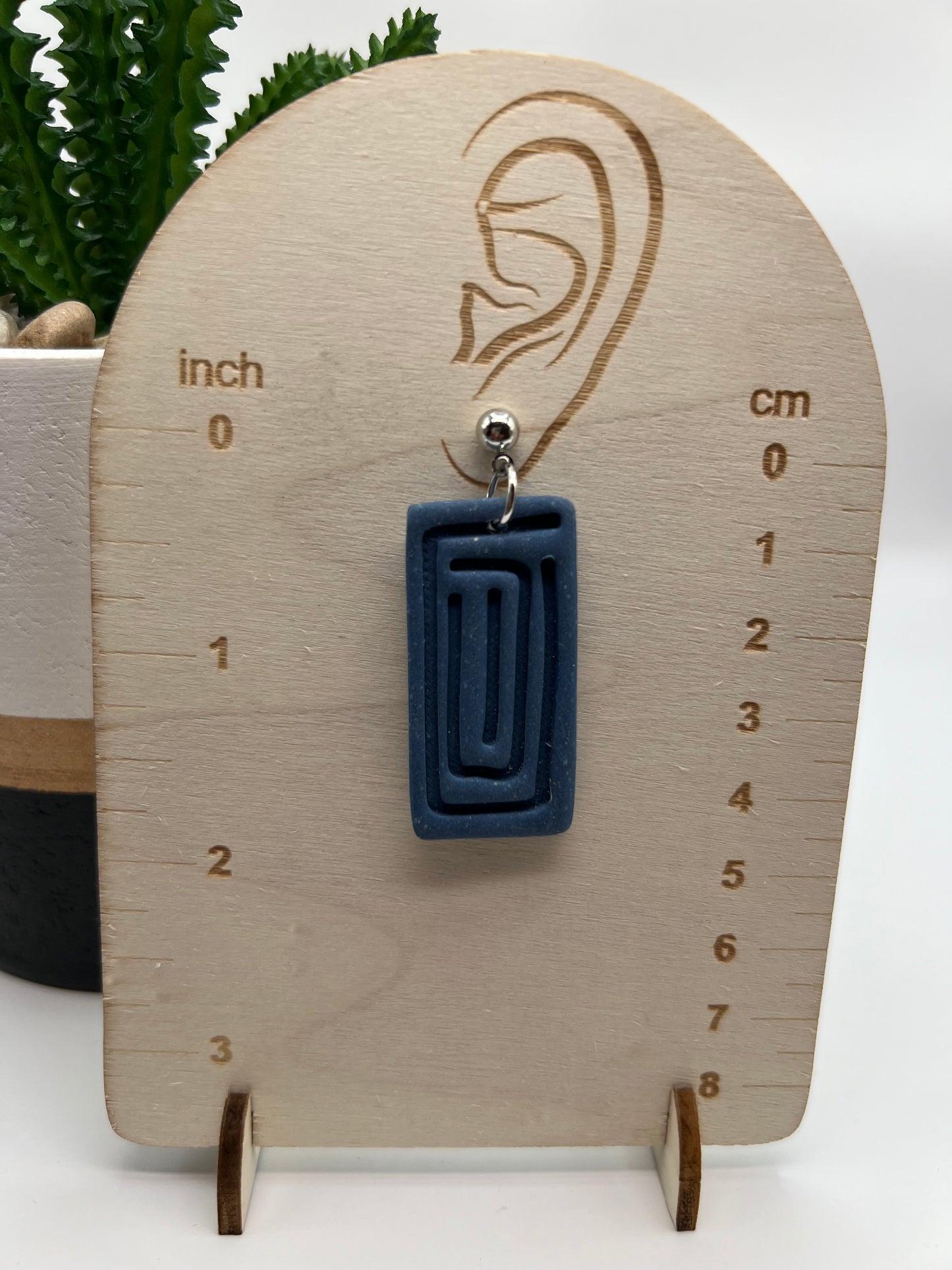 Blue geometric dangle