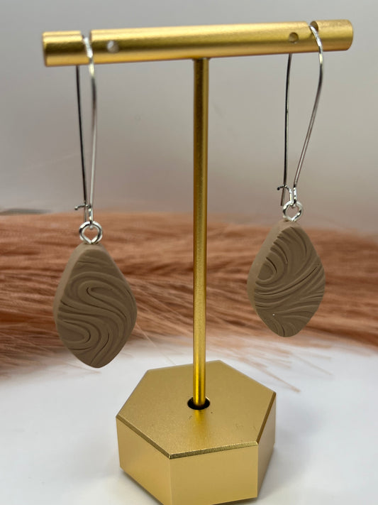 Brown elongated oval dangles
