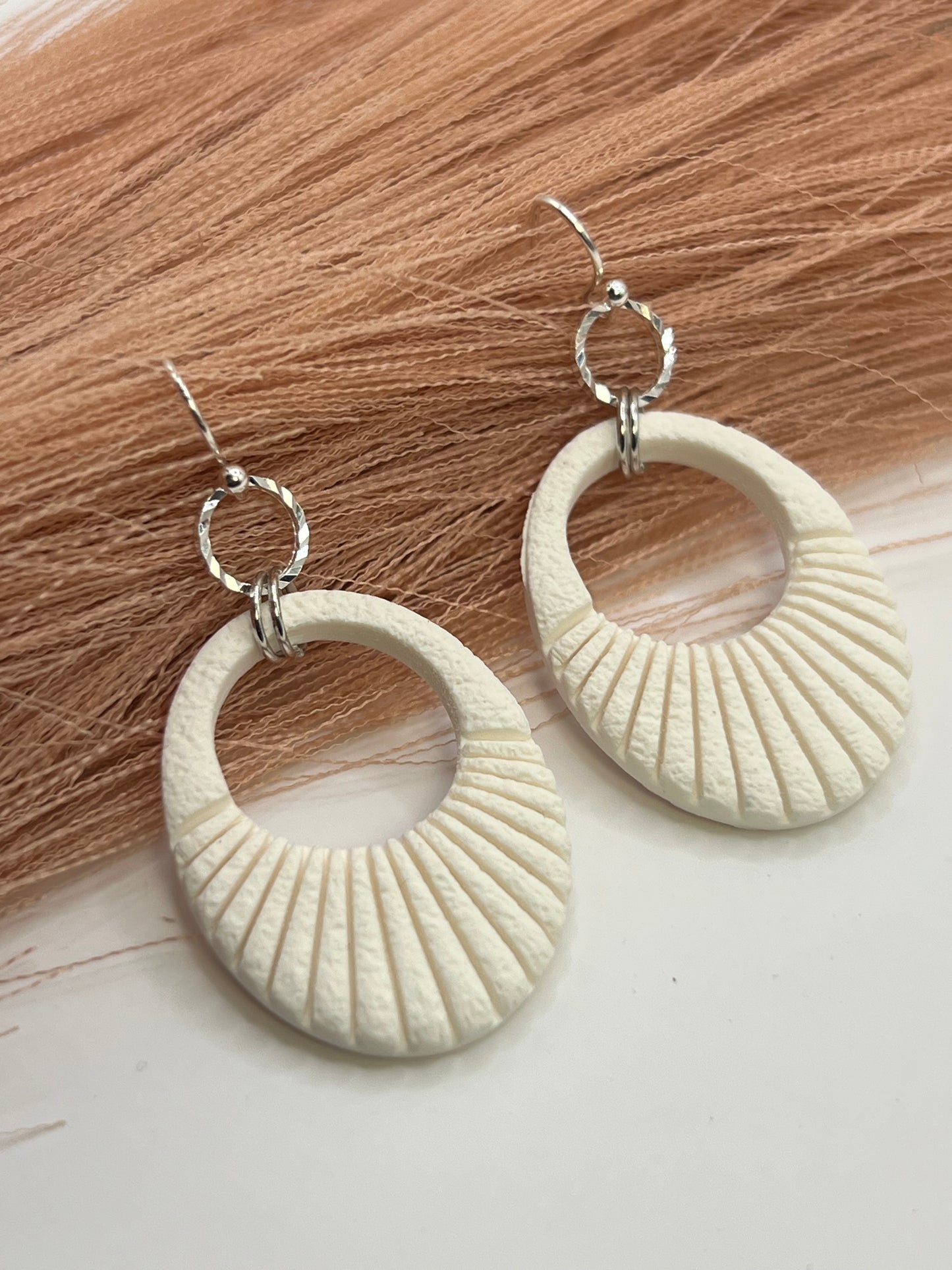 White scalloped dangles