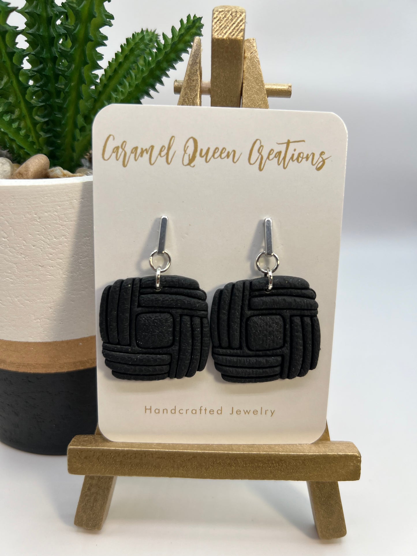 Black imprinted square dangles