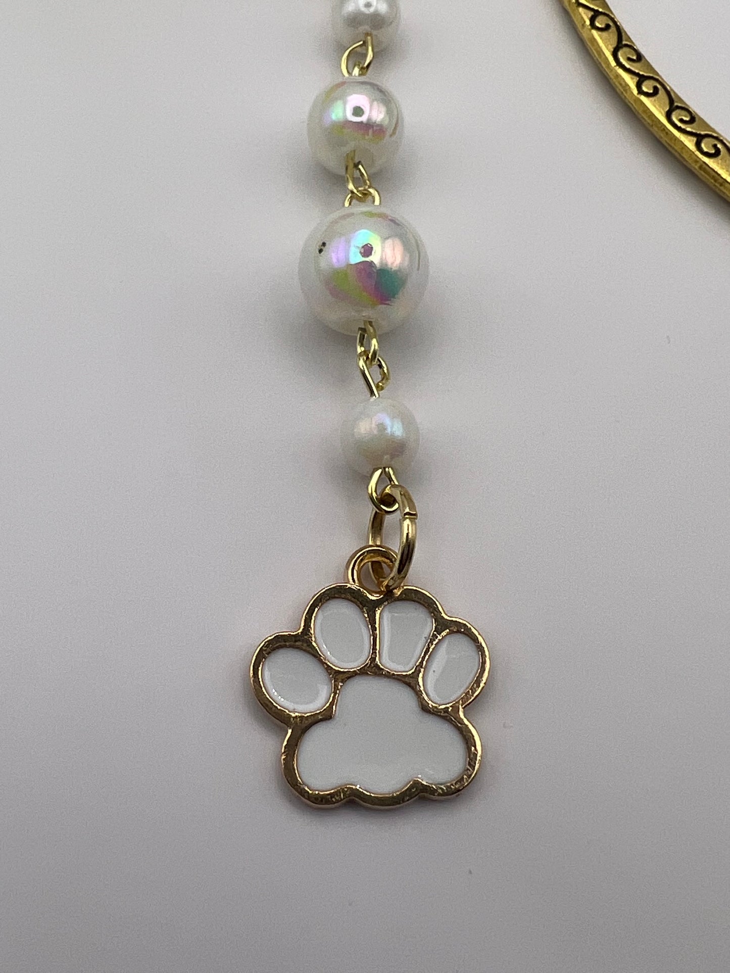 Iridescent beaded dog paw bookmark