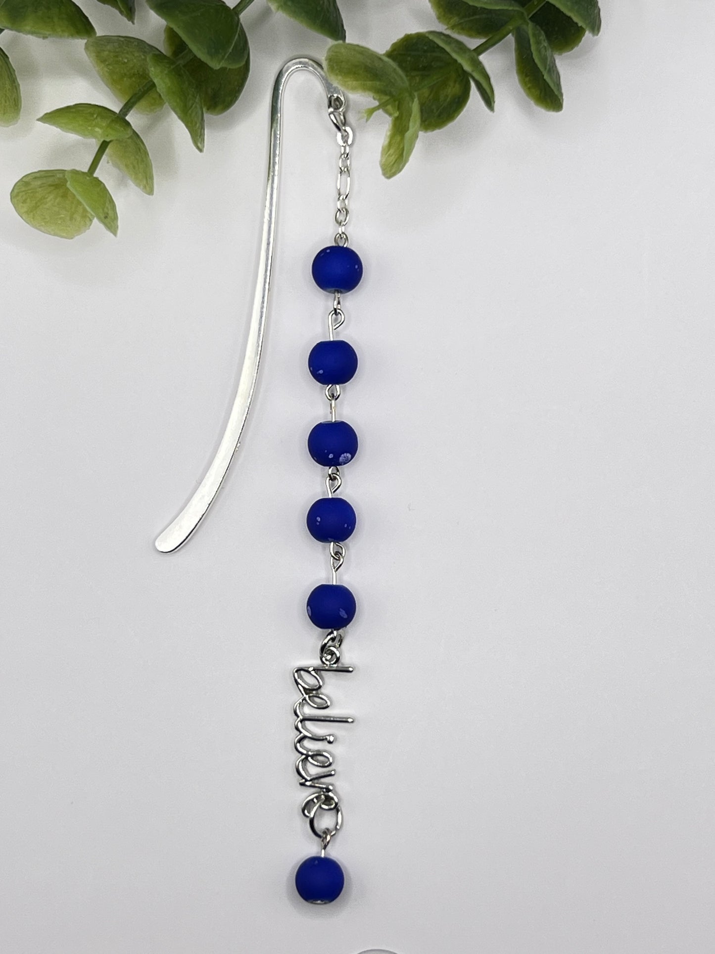 Royal blue “believe”beaded bookmark