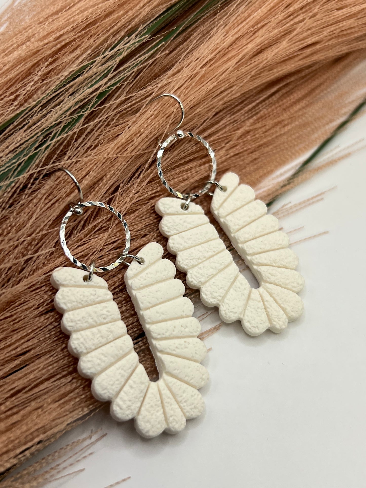 Long white scalloped dangles