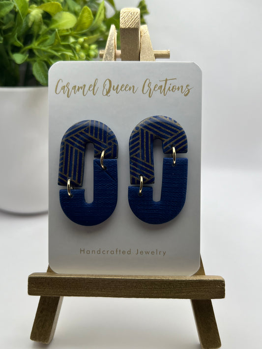 Navy blue “split” dangles with gold print