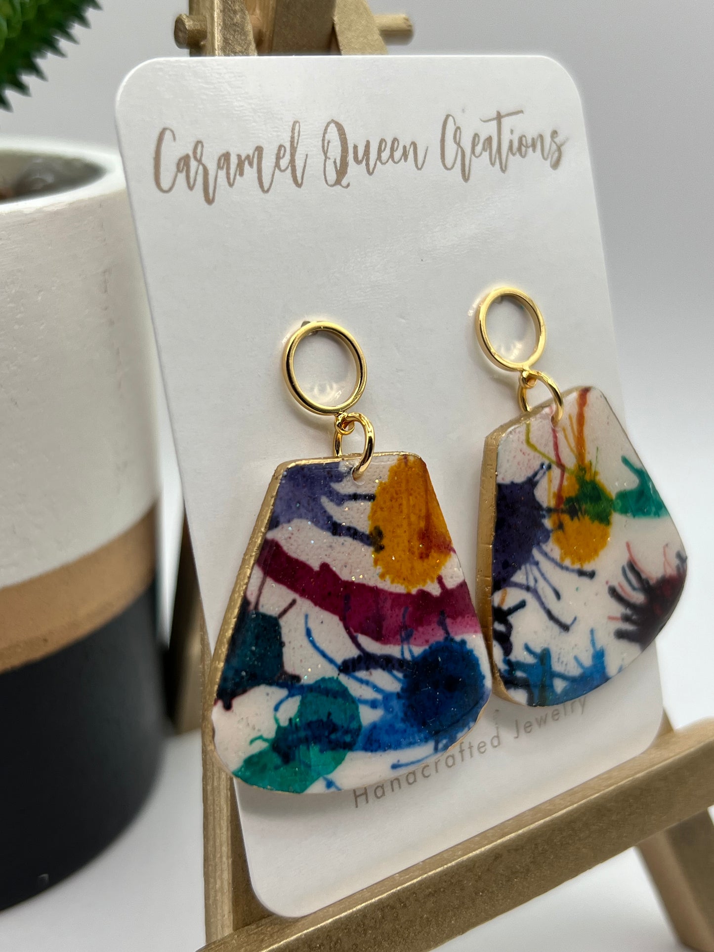 Paint splatter inspired dangles with gold trim