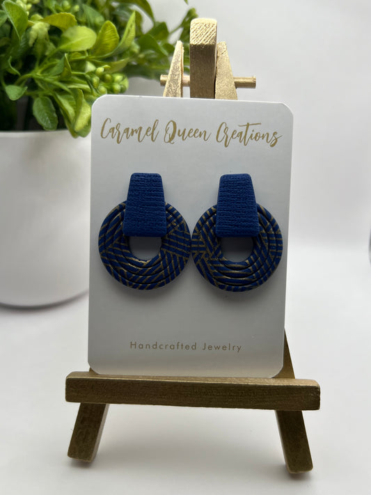 Navy blue studs with gold print