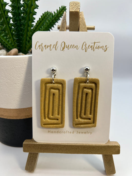 Mustard geometric dangles