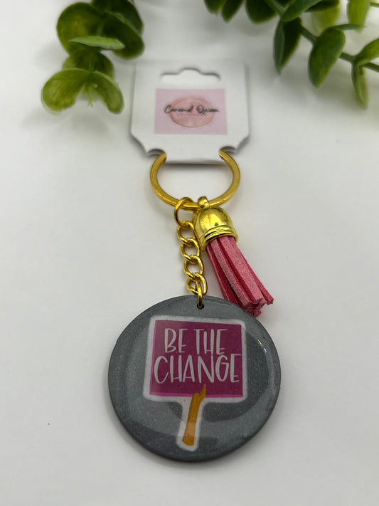 "Be the change" keychain with tassel