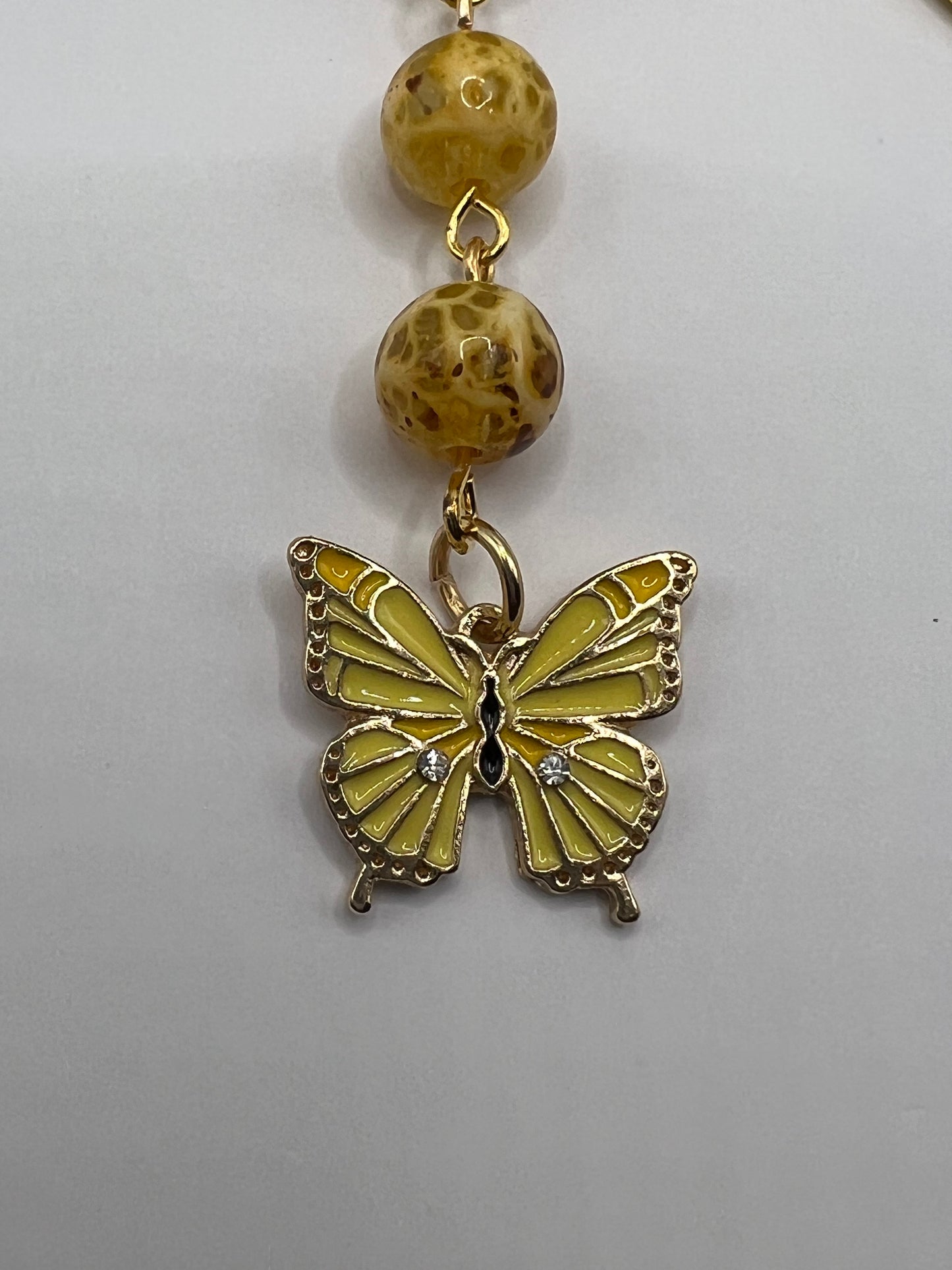 Speckled yellow butterfly beaded bookmark