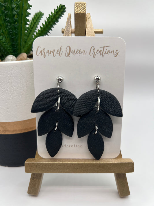 Black three tier dangle earrings