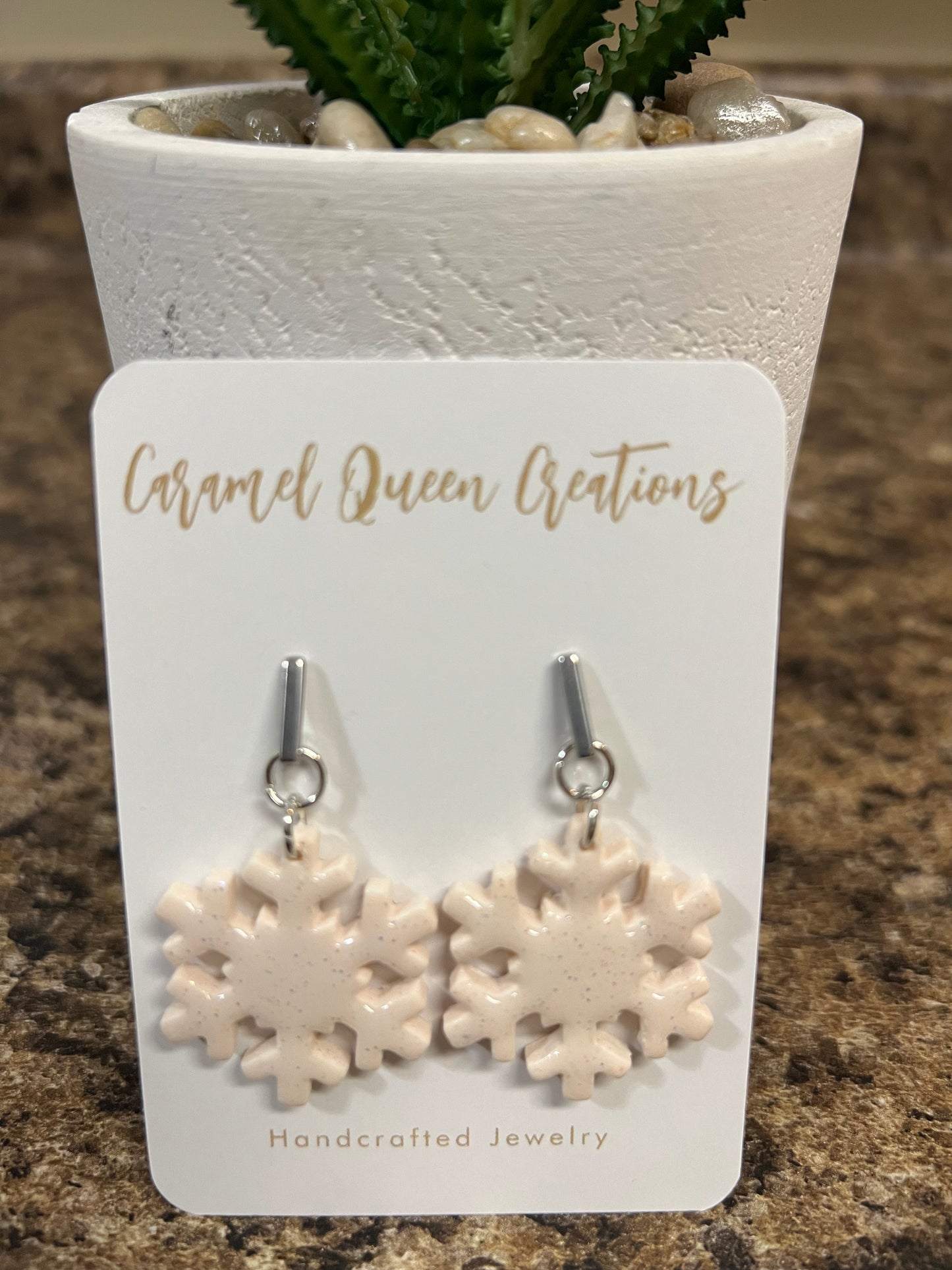 Snowflake dangle earrings