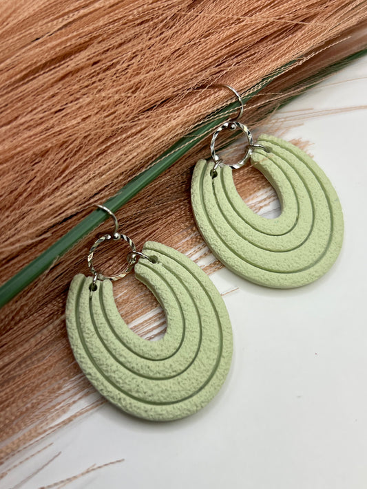 Mint green imprinted dangles