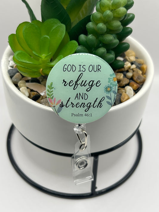 “God is our refuge” badge reel