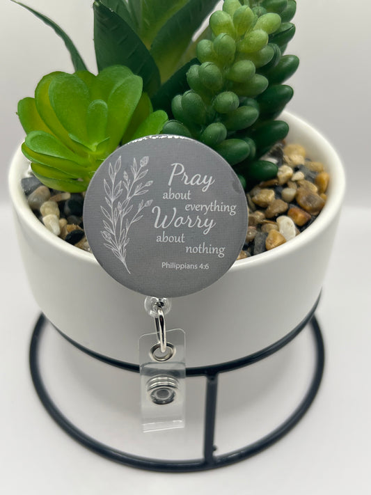 “Pray for everything” badge reel