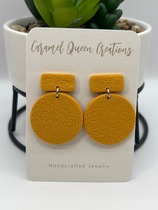 Mustard yellow circular dangles
